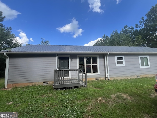 818 Arch Tanner Rd, Bethlehem, GA 30620 - view of front of property with crawl space, a metal roof, and a front yard