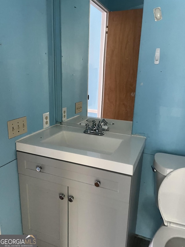 818 Arch Tanner Rd, Bethlehem, GA 30620 - half bathroom featuring vanity and toilet