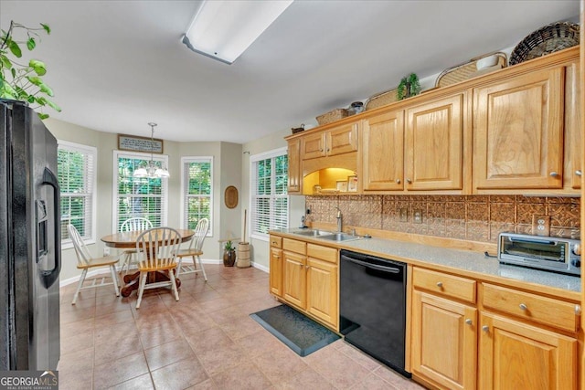 536 Sam Brown Blvd, Commerce, GA 30529 - kitchen with black appliances, light countertops, backsplash, and light tile patterned flooring