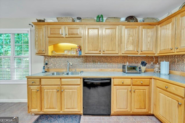 536 Sam Brown Blvd, Commerce, GA 30529 - kitchen with dishwasher, light countertops, tasteful backsplash, and light brown cabinets