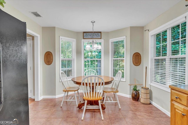 536 Sam Brown Blvd, Commerce, GA 30529 - dining room with light tile patterned floors