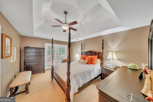 536 Sam Brown Blvd, Commerce, GA 30529 - bedroom featuring a raised ceiling, access to exterior, light colored carpet, and a ceiling fan