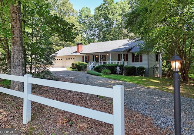 77 Chestatee Dr, Blairsville, GA 30512 - ranch-style house with a porch, driveway, an attached garage, a chimney, and roof with shingles
