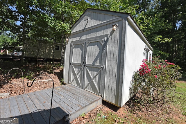 77 Chestatee Dr, Blairsville, GA 30512 - view of shed featuring view of wooded area
