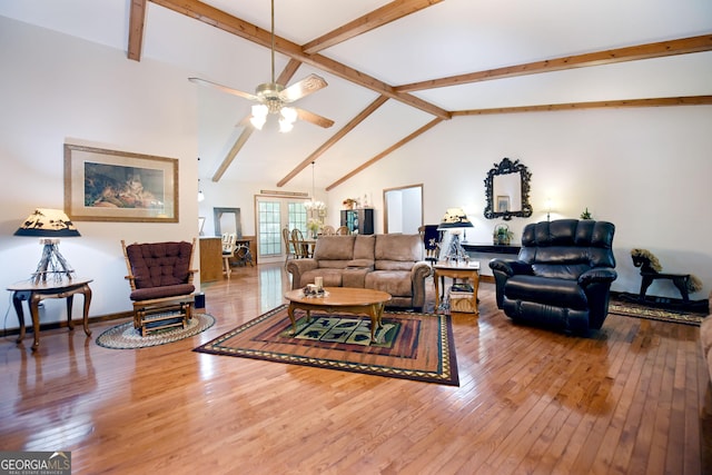 77 Chestatee Dr, Blairsville, GA 30512 - living area with wood finished floors, beam ceiling, a ceiling fan, and high vaulted ceiling