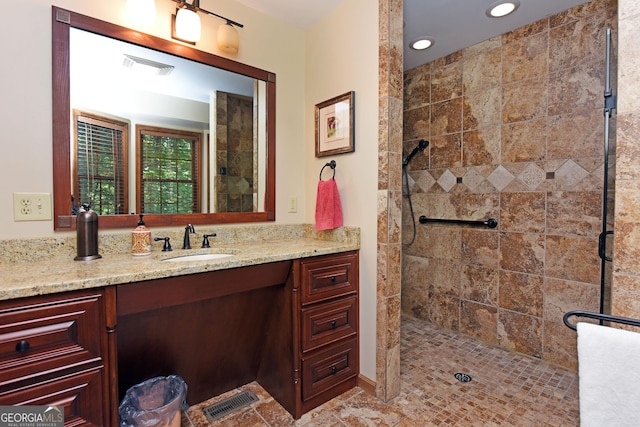 77 Chestatee Dr, Blairsville, GA 30512 - bathroom featuring vanity, a tile shower, and recessed lighting