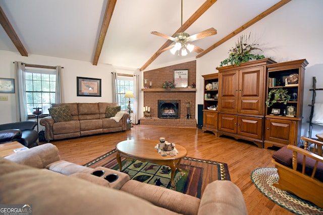 77 Chestatee Dr, Blairsville, GA 30512 - living area with ceiling fan, light wood finished floors, plenty of natural light, and a fireplace