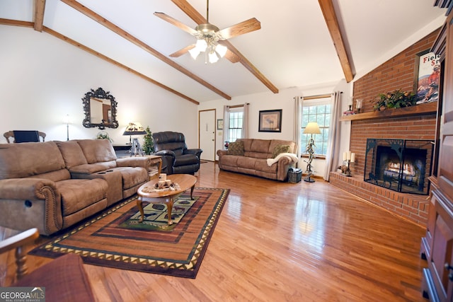 77 Chestatee Dr, Blairsville, GA 30512 - living area featuring a ceiling fan, a fireplace, and wood finished floors