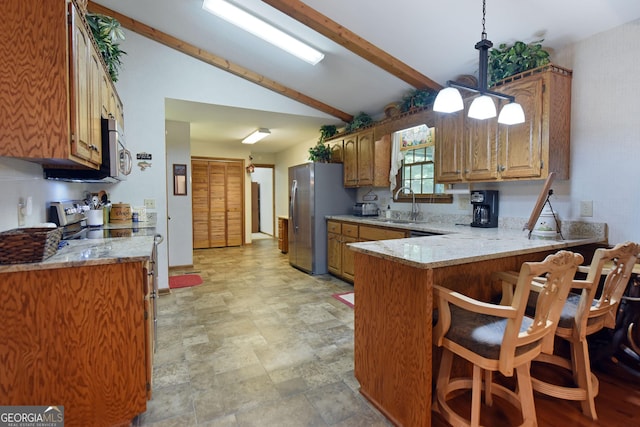 77 Chestatee Dr, Blairsville, GA 30512 - kitchen featuring appliances with stainless steel finishes, a peninsula, a breakfast bar, pendant lighting, and light stone countertops