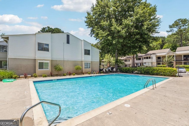 1504 Wingate Way, Atlanta, GA 30350 - community pool featuring a patio area