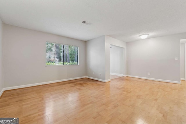 1504 Wingate Way, Atlanta, GA 30350 - spare room featuring light wood finished floors and baseboards