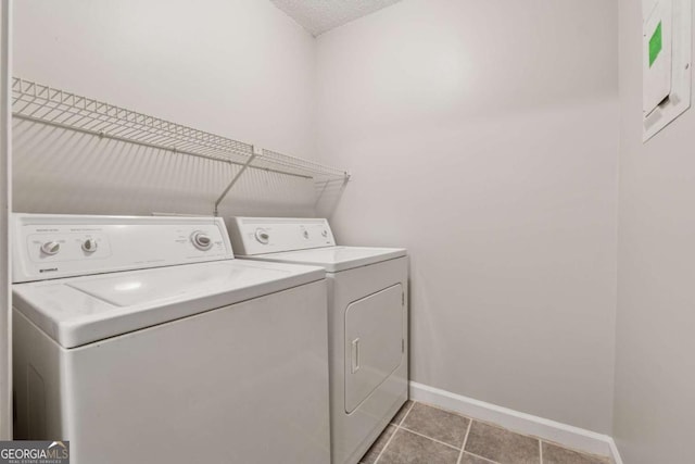 1504 Wingate Way, Atlanta, GA 30350 - laundry area with independent washer and dryer and light tile patterned flooring