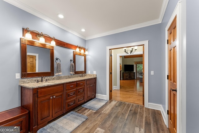 712 Meadow Run Ct, Clarkesville, GA 30523 - full bathroom with wood finished floors, ornamental molding, double vanity, a chandelier, and recessed lighting