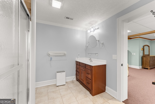 712 Meadow Run Ct, Clarkesville, GA 30523 - bathroom with vanity, crown molding, tile patterned flooring, and a textured ceiling