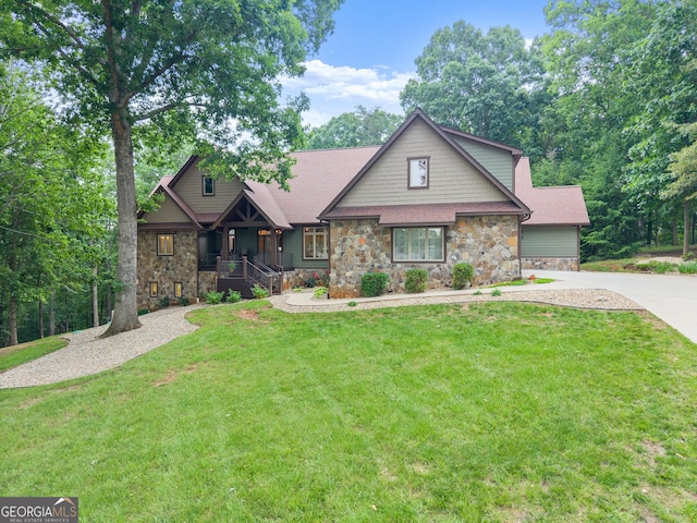 712 Meadow Run Ct, Clarkesville, GA 30523 - craftsman inspired home featuring stone siding, a front yard, and driveway