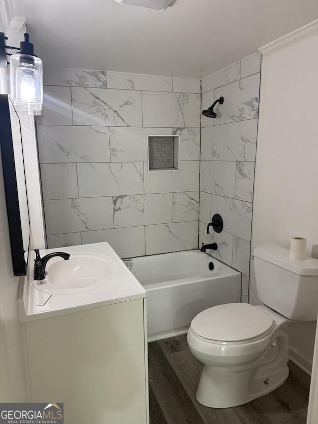 1220 Harmony St, Gainesville, GA 30501 - bathroom with wood finished floors, vanity, and shower / bathtub combination