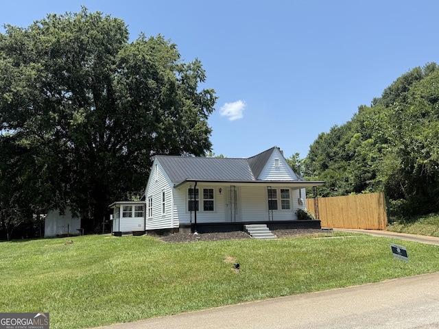 1220 Harmony St, Gainesville, GA 30501 - view of front of property with a porch and a metal roof