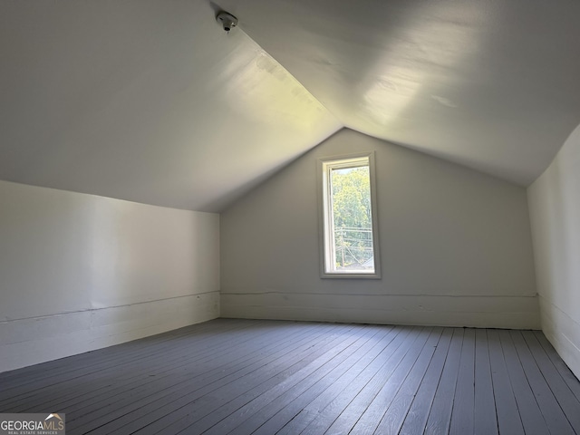 1220 Harmony St, Gainesville, GA 30501 - additional living space with hardwood / wood-style floors and vaulted ceiling
