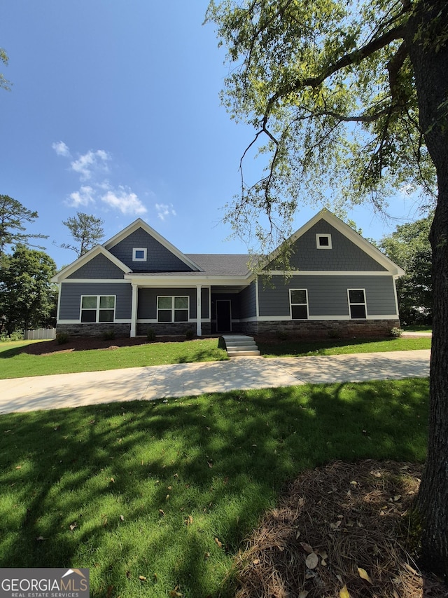 1090 Fox Glen Dr, Watkinsville, GA 30677 - view of front of home with stone siding and a front lawn