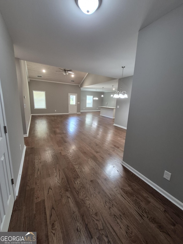 1090 Fox Glen Dr, Watkinsville, GA 30677 - unfurnished living room with dark wood finished floors, a chandelier, a ceiling fan, and lofted ceiling