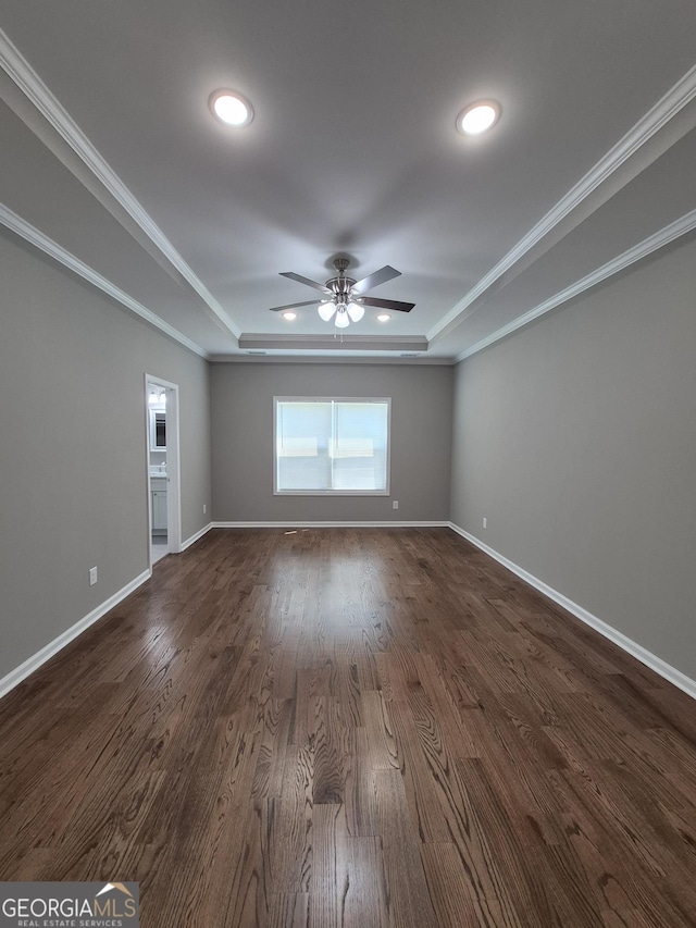 1090 Fox Glen Dr, Watkinsville, GA 30677 - spare room with a raised ceiling, recessed lighting, ceiling fan, dark wood finished floors, and crown molding