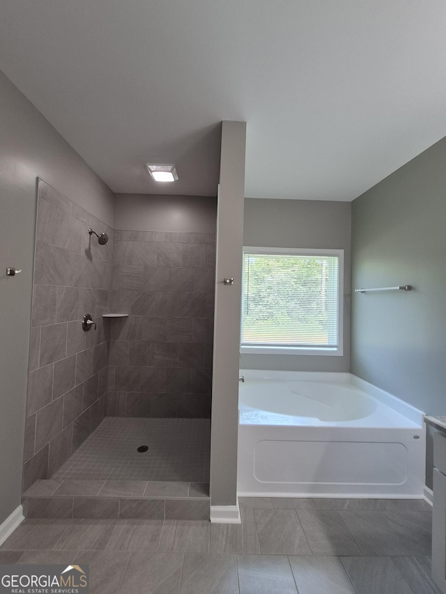 1090 Fox Glen Dr, Watkinsville, GA 30677 - bathroom featuring a garden tub and a tile shower