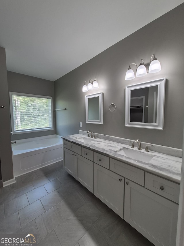 1090 Fox Glen Dr, Watkinsville, GA 30677 - bathroom featuring double vanity and a bath
