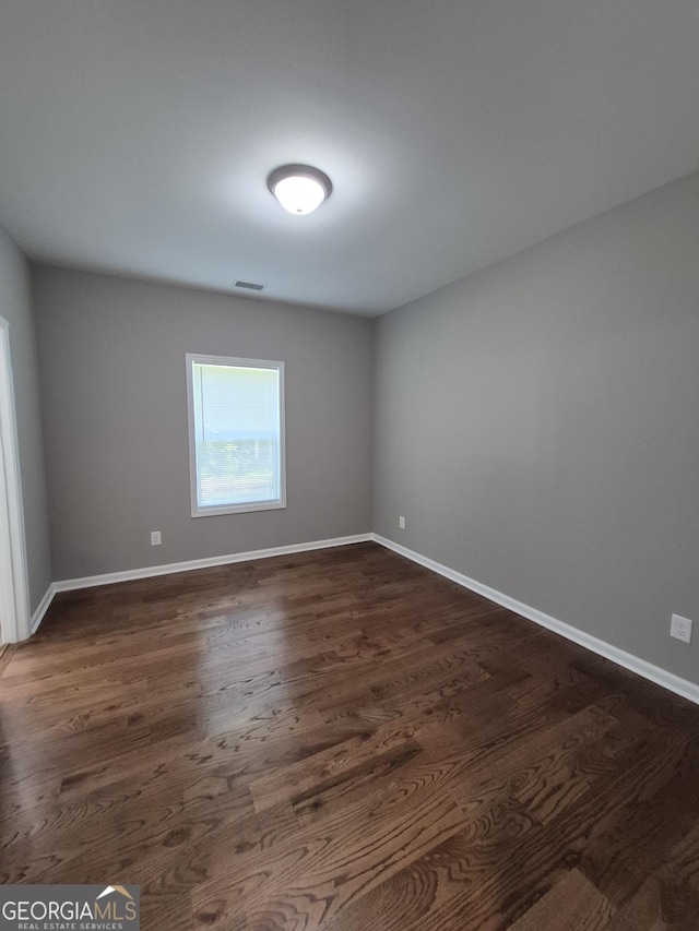 1090 Fox Glen Dr, Watkinsville, GA 30677 - spare room featuring dark wood-style floors