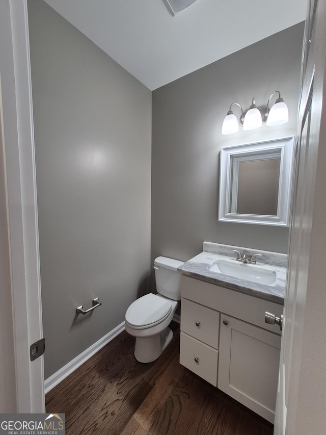 1090 Fox Glen Dr, Watkinsville, GA 30677 - bathroom featuring vanity and wood finished floors