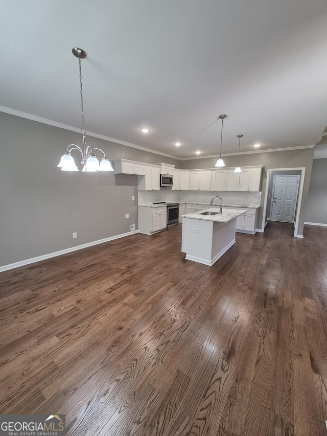 1090 Fox Glen Dr, Watkinsville, GA 30677 - kitchen with stainless steel appliances, ornamental molding, white cabinets, light countertops, and recessed lighting