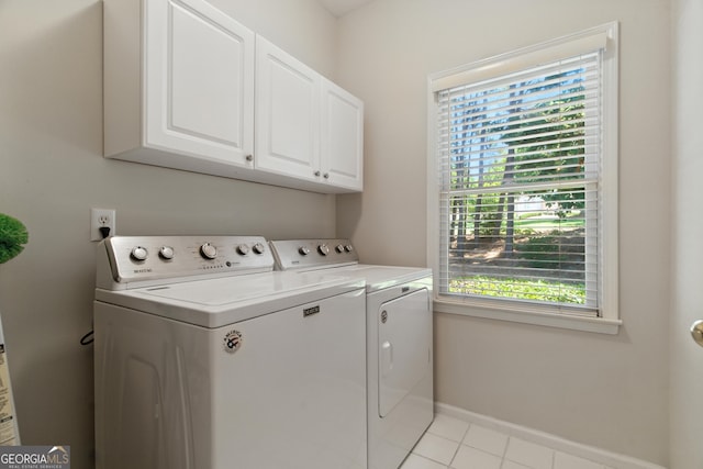 2832 Windrush Dr, Buford, GA 30518 - washroom featuring independent washer and dryer, cabinet space, and light tile patterned floors