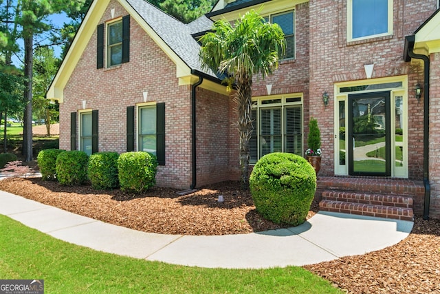 2832 Windrush Dr, Buford, GA 30518 - view of front of home featuring brick siding and a shingled roof