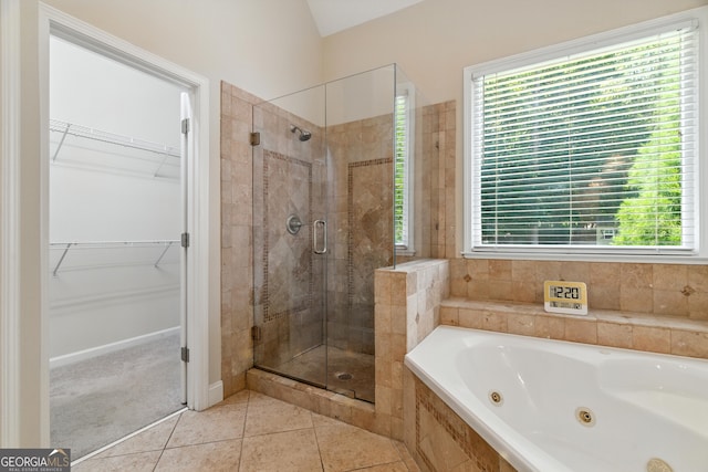 2832 Windrush Dr, Buford, GA 30518 - bathroom with a shower stall, a tub with jets, tile patterned floors, and a walk in closet