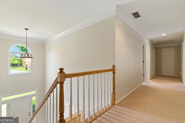 2832 Windrush Dr, Buford, GA 30518 - corridor with an upstairs landing, attic access, ornamental molding, and light carpet