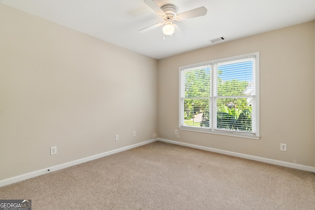 2832 Windrush Dr, Buford, GA 30518 - unfurnished room with light carpet and a ceiling fan