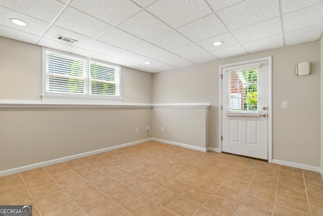 2832 Windrush Dr, Buford, GA 30518 - unfurnished room featuring a paneled ceiling, recessed lighting, and light tile patterned floors