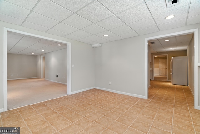 2832 Windrush Dr, Buford, GA 30518 - unfurnished room featuring recessed lighting, a paneled ceiling, and light tile patterned floors
