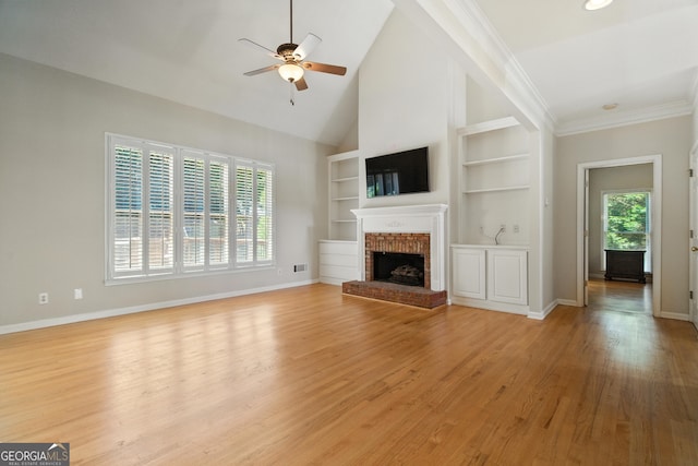 2832 Windrush Dr, Buford, GA 30518 - unfurnished living room with a fireplace, built in features, a ceiling fan, light wood finished floors, and ornamental molding