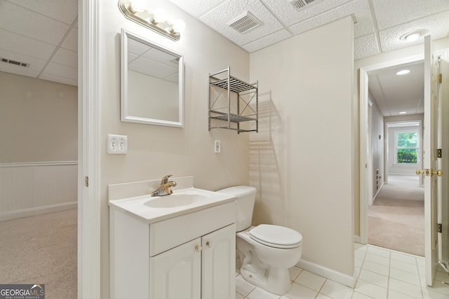 2832 Windrush Dr, Buford, GA 30518 - bathroom featuring a paneled ceiling, vanity, and tile patterned flooring