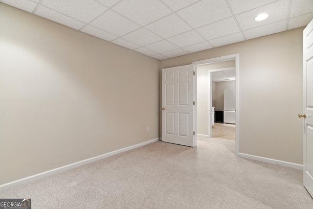 2832 Windrush Dr, Buford, GA 30518 - unfurnished bedroom featuring light colored carpet, a paneled ceiling, and freestanding refrigerator