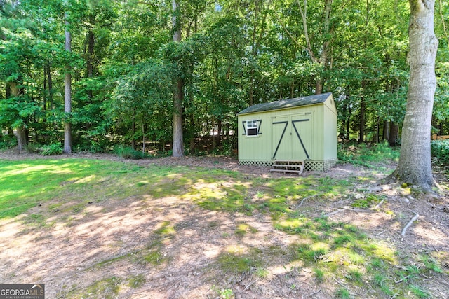 2832 Windrush Dr, Buford, GA 30518 - view of yard featuring a storage shed