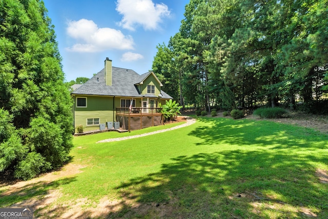 2832 Windrush Dr, Buford, GA 30518 - view of green lawn with a deck