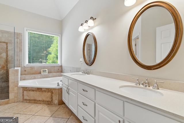 2832 Windrush Dr, Buford, GA 30518 - bathroom featuring a bath, tile patterned floors, double vanity, a shower stall, and lofted ceiling