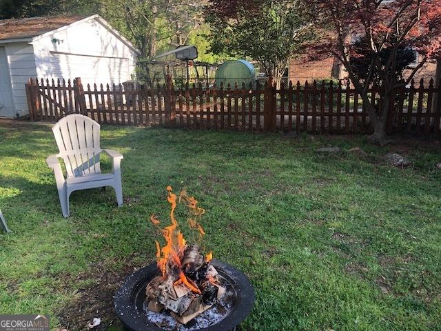 2920 Appling Dr, Atlanta, GA 30341 - view of yard with an outdoor fire pit