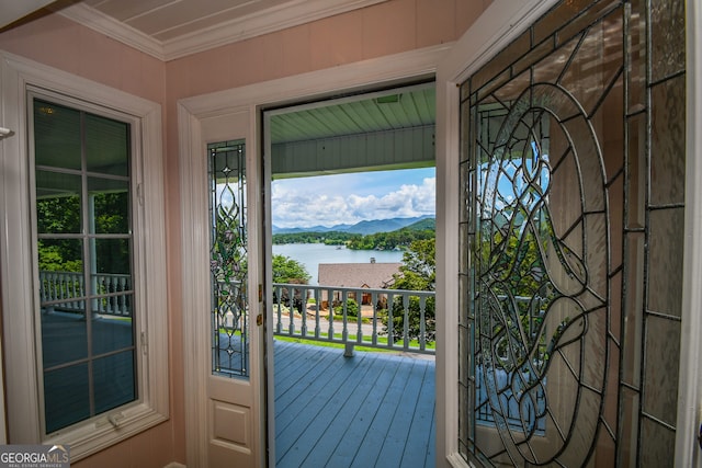 2722 Hidden Valley Rd, Hiawassee, GA 30546 - doorway to outside with a water view, crown molding, and hardwood / wood-style floors