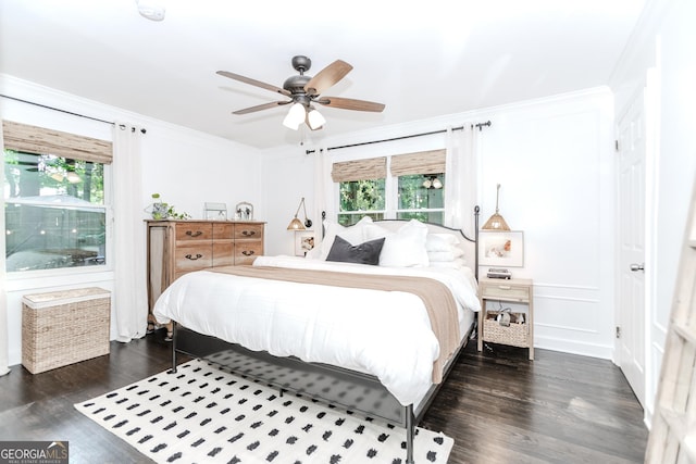 706 Powder Springs St SE, Smyrna, GA 30080 - bedroom featuring dark wood-style floors, ornamental molding, and a ceiling fan