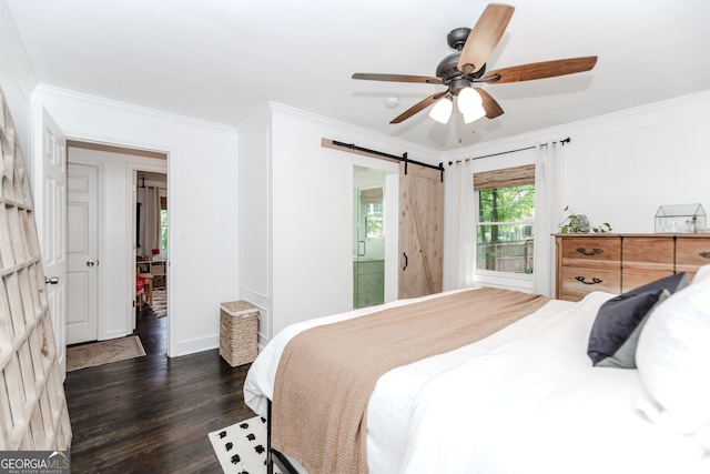 706 Powder Springs St SE, Smyrna, GA 30080 - bedroom with dark wood-type flooring, crown molding, a barn door, and ceiling fan