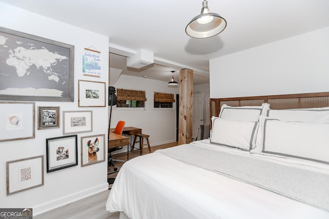 706 Powder Springs St SE, Smyrna, GA 30080 - bedroom featuring baseboards and light wood-style floors