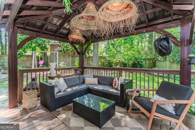 706 Powder Springs St SE, Smyrna, GA 30080 - wooden deck with a gazebo, a fenced backyard, and an outdoor hangout area