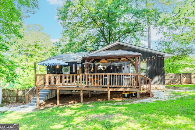 706 Powder Springs St SE, Smyrna, GA 30080 - back of house with a deck and stairway